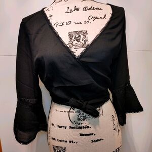 Wrap top with bell sleeves